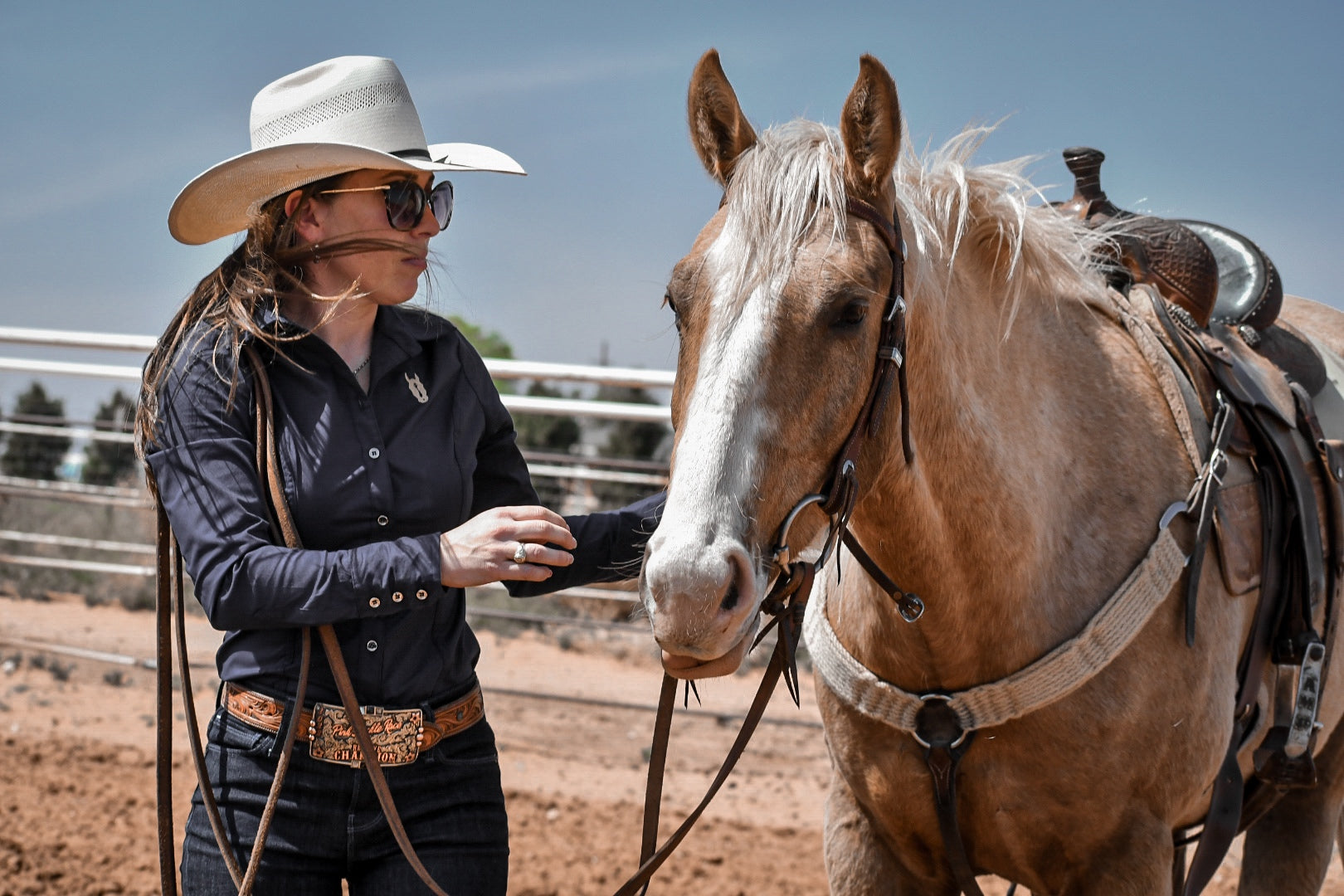 Navy Button Up to keep cool in the heat, adjustable metal cuff buttons, and professional fit