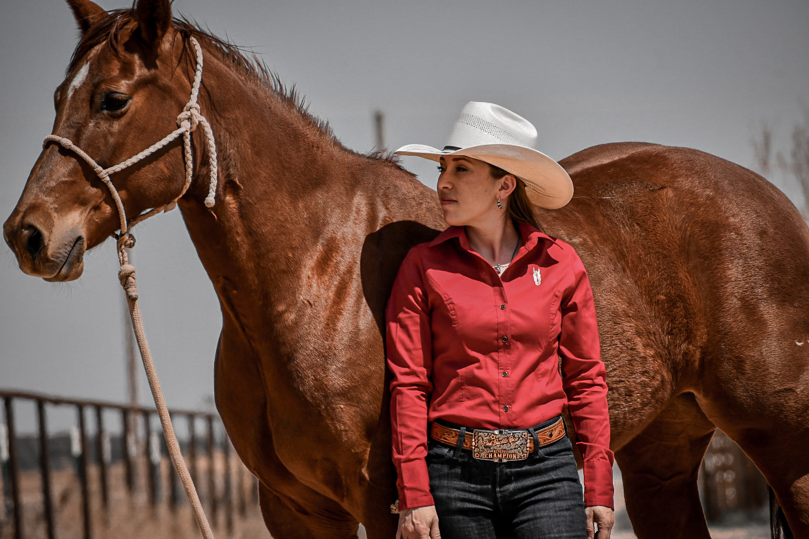 Fitted Western shirt on cowgirl standing next to her horse