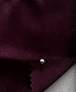 Close up of dark red/ wine colored satin
