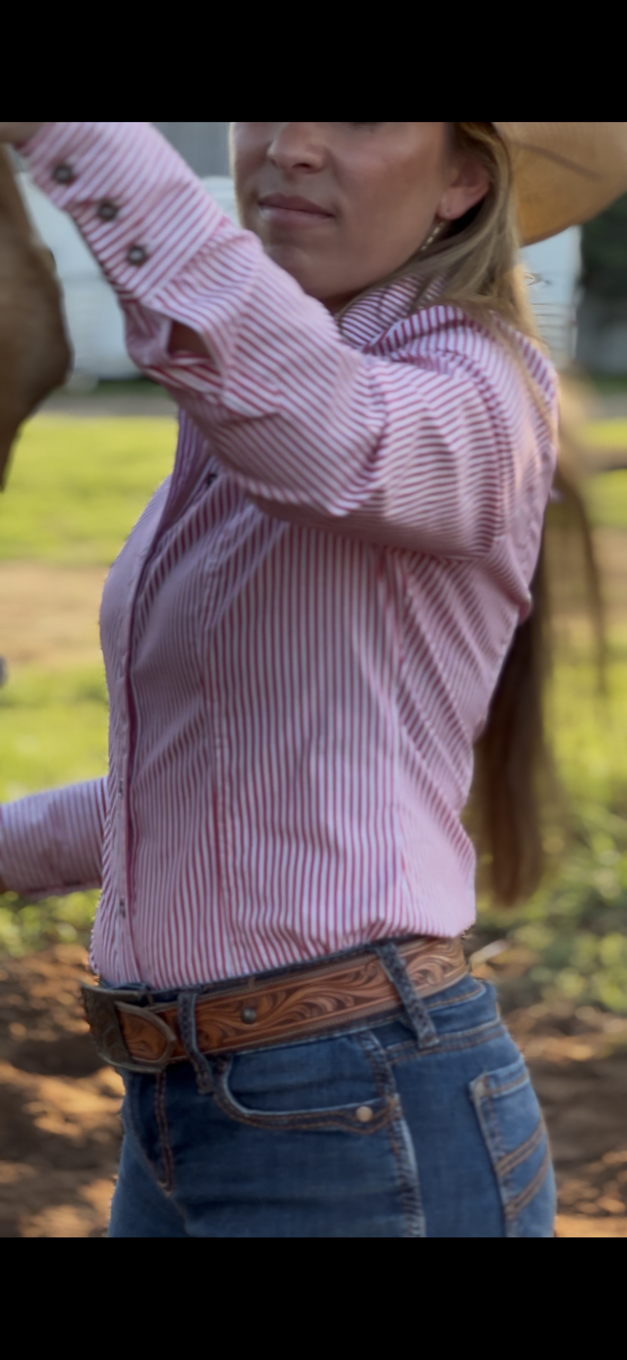 Light purple button-up shirt with blue pinstripes, long sleeves, and a collared neckline.