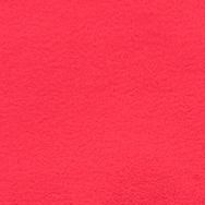 A close-up of a bright pink fabric swatch with a small white circular label reading '25' and a metal ruler along the right edge for scale.